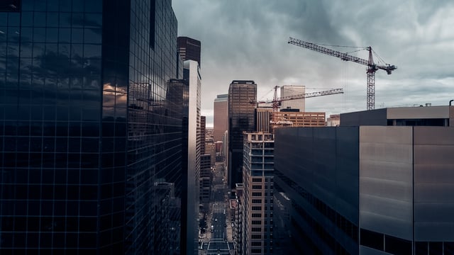 Central-Denver-with-overcast-skies-and-construction-crane.jpg