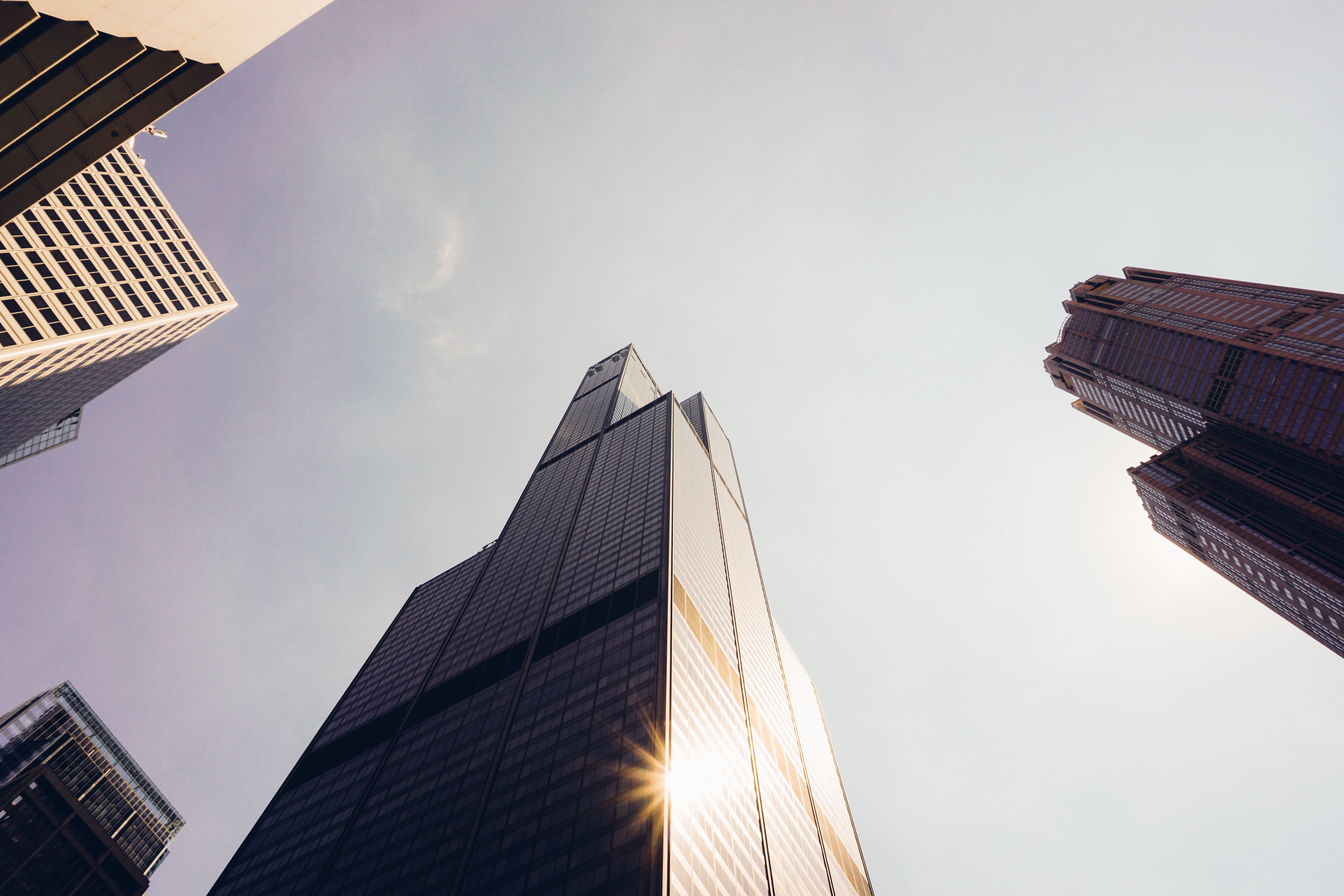 willis-tower-upward-view-with-sun-flare